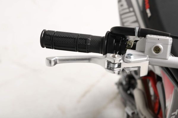 TrailMaster MK125 Dirt Bike 4-Speed Manual Dual Disc Brakes, Electric Start (14/12), Ages 12 and up