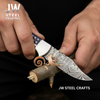 American Flag Damascus Folding Hunter with Ram Horn Handle