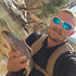 files/Angler_Holding_Trout_with_Wasatch_Tenkara_Snub_Nose_IV_Fly_Rod_on_Mountain_Stream.jpg