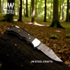 American Flag Damascus Folding Hunter with Ram Horn Handle