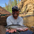 files/Proud_Catch_Brook_Trout_by_the_Stream.jpg