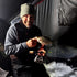 files/Smiling_Angler_with_Crappie_in_Ice_Fishing_Shelter.jpg