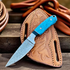 files/cowboy-hunting-knife-damascus-marble-handle-pancake-sheath_1.webp